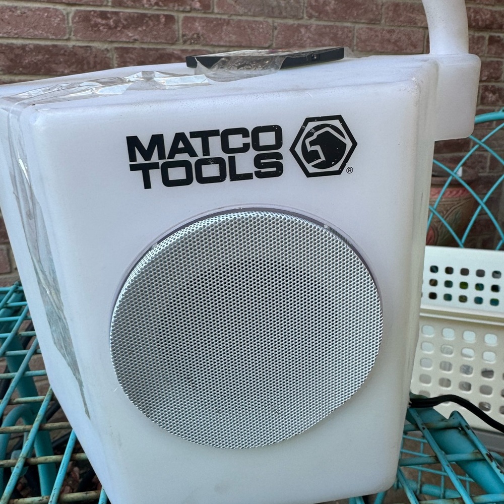 White Portable Boombox with Minimalist Design and Compact Size
